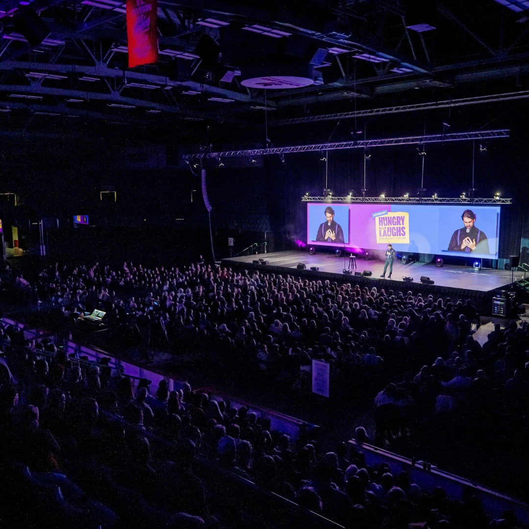 A full audience watching Hungry for Laughs