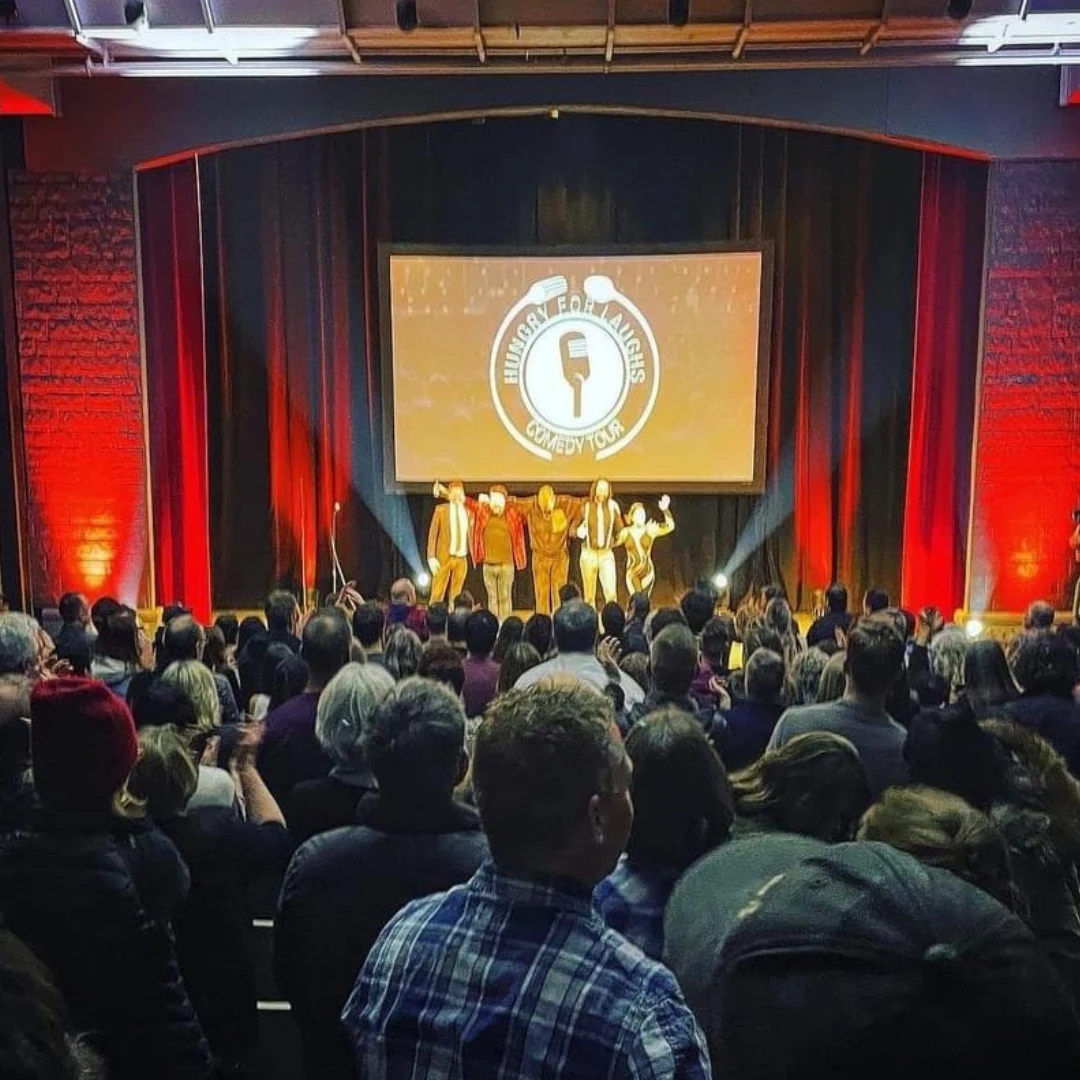 The audience applauding the tour performers
